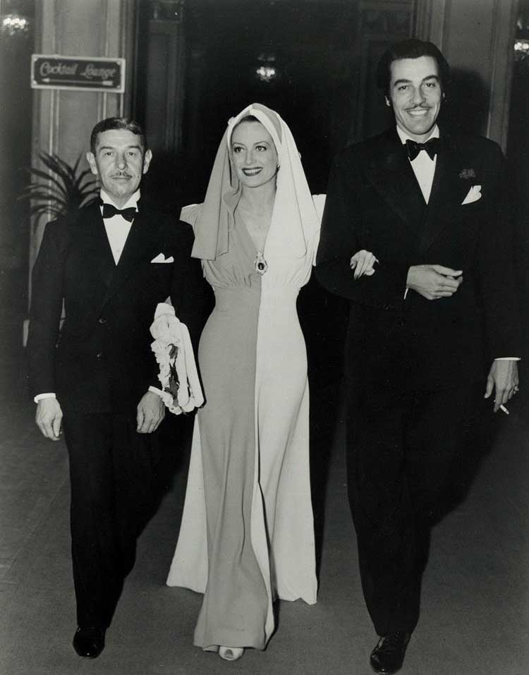 1939. At the Cocoanut Grove with Mike Romanoff, left, and Cesar Romero.