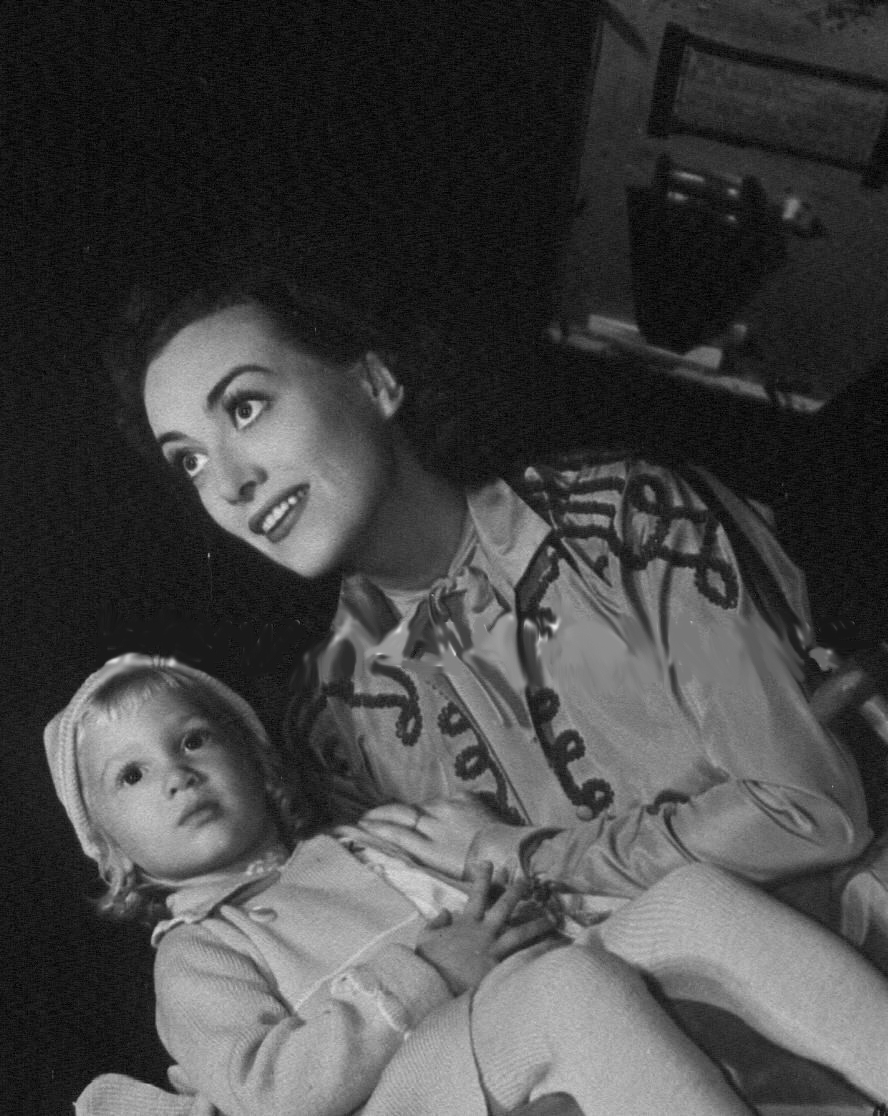 1937. On the set of 'The Last of Mrs. Cheyney' with niece Joanie LeSueur.