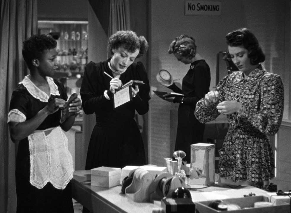 1939. Screen shot from 'The Women' with Butterfly McQueen, left.