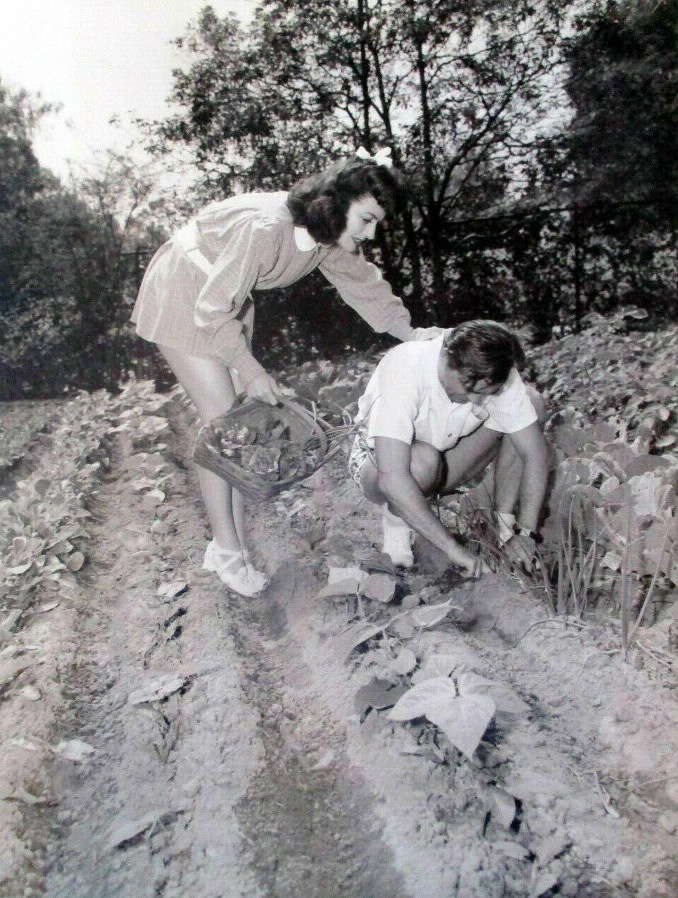 1944. At home with husband Phil Terry and Victory Garden.