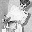 1943. Joan works for the American Women's Voluntary Services.