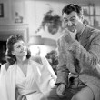 Candid on the set of 'When Ladies Meet' with Robert Taylor.