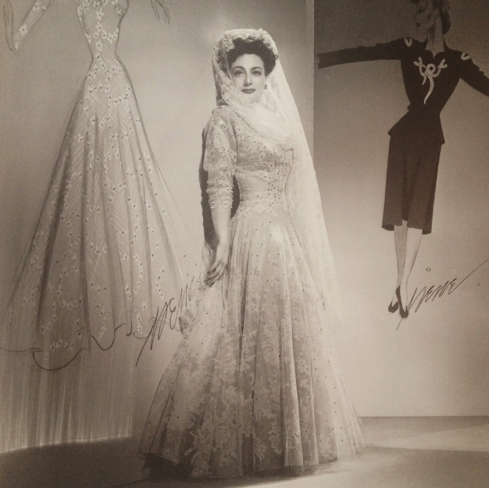 1942. Publicity for 'Reunion in France' with costume sketches by Irene.
