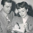 1943. An MGM book drive, with husband Phillip Terry.