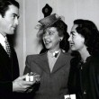 December 1945, with Gregory Peck and Kay Proctor (includes press caption).