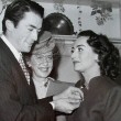 December 1945. With Gregory Peck and Kay Proctor, receiving the Golden Apple award.