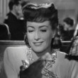 1945. 'Mildred Pierce.' With Zachary Scott.