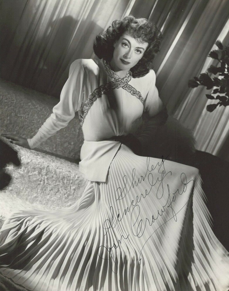 1945 publicity for 'Mildred Pierce' shot by Bert Six.