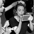 1947. Makeup and hair on the set of 'Daisy Kenyon.'