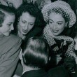 February 1947 candid at the 'Look' awards party with Laraine Day, Dot Myberg, and Leo Durocher. (Includes press caption.)