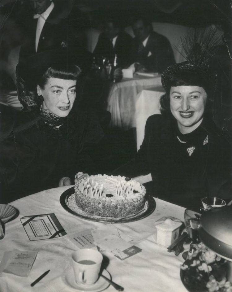April 1948. With Warners publicist Lucia Perrigo at Chicago's Pump Room.