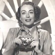 1951. Joan promotes Foton cameras in conjunction with the release of 'Goodbye My Fancy.'
