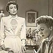 1951. 'Goodbye My Fancy.' With Eve Arden. And a dress that inexplicably stays unbuttoned for over 5 minutes of the film!