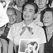 August 7, 1952. Joan and fans at the premiere of 'Sudden Fear.'