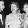 1952. At Judy Garland's April 21 LA Philharmonic show with Mel Dinelli and Mona Freeman.