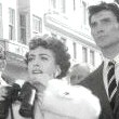 A street shot on the set of 'Sudden Fear,' with Jack Palance. (Includes press caption.)