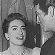 1953. Joan visits Robert Taylor on the set of 'All the Brothers Were Valiant,' a remake of Joan's 1928 silent film, 'Across to Singapore.'