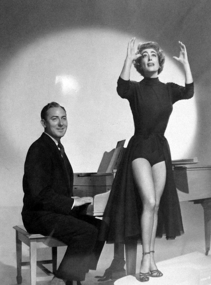 1953. 'Torch Song' publicity with Michael Wilding.