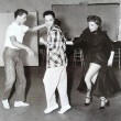 1953. On the set of 'Torch Song' with Mark Wilder and Judy Landon. (Includes press caption.)