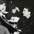 November 1953. With fan-club members at the 'Torch Song' premiere.