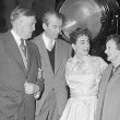 12/31/54. Two photos on the 'Female on the Beach' set with James Stewart and his father. (The older woman is unknown.)