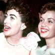 April 1954, with Debbie Reynolds.