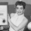 1955. Receiving the Golden Shutter Award from the LA Press Photographers Assoc.