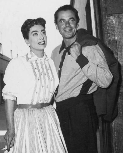 1956. On the set of 'Autumn Leaves' with old flame Glenn Ford.