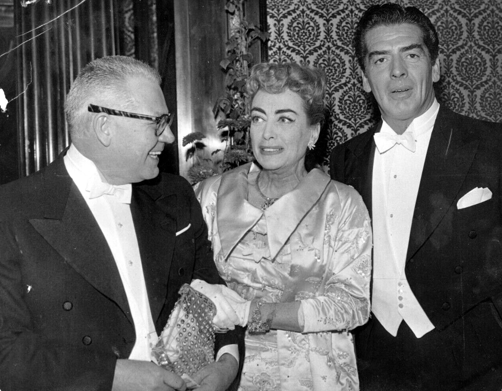 10/29/56. At the Royal Film Performance with husband Al Steele and Victor Mature.