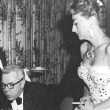 April 24, 1957. Celebrating Al's birthday at '21' in NYC. Mrs. Alfred Bloomingdale is to left.