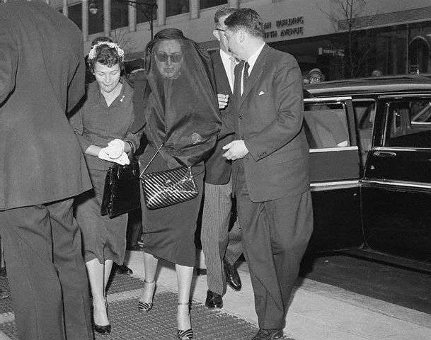 April 22, 1959. Arriving for Al Steele's funeral, with his daughter Sally.