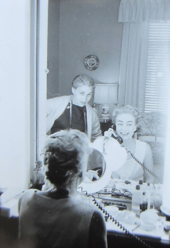 1959. Eve Arnold with Joan on the 'Best of Everything' set. (Thanks to James-Paul Amato.)