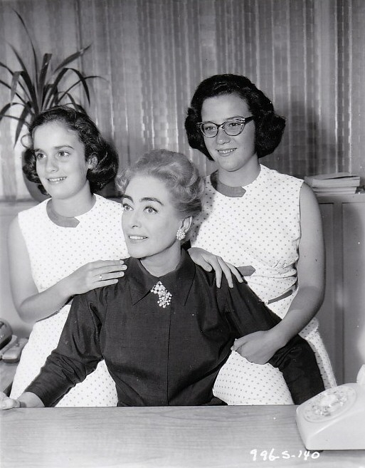 1959. On the set of 'The Best of Everything.' With twins Cathy and Cindy.