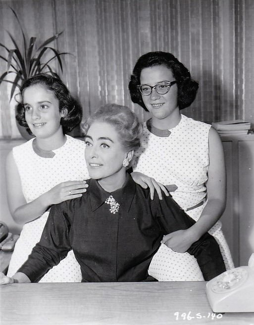 1959. On the set of 'The Best of Everything.' With twins Cathy and Cindy.