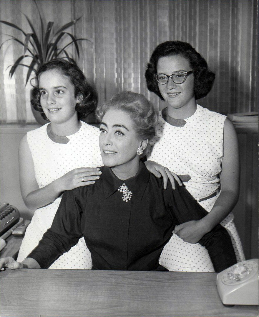 1959. On the set of 'The Best of Everything.' With twins Cathy and Cindy.