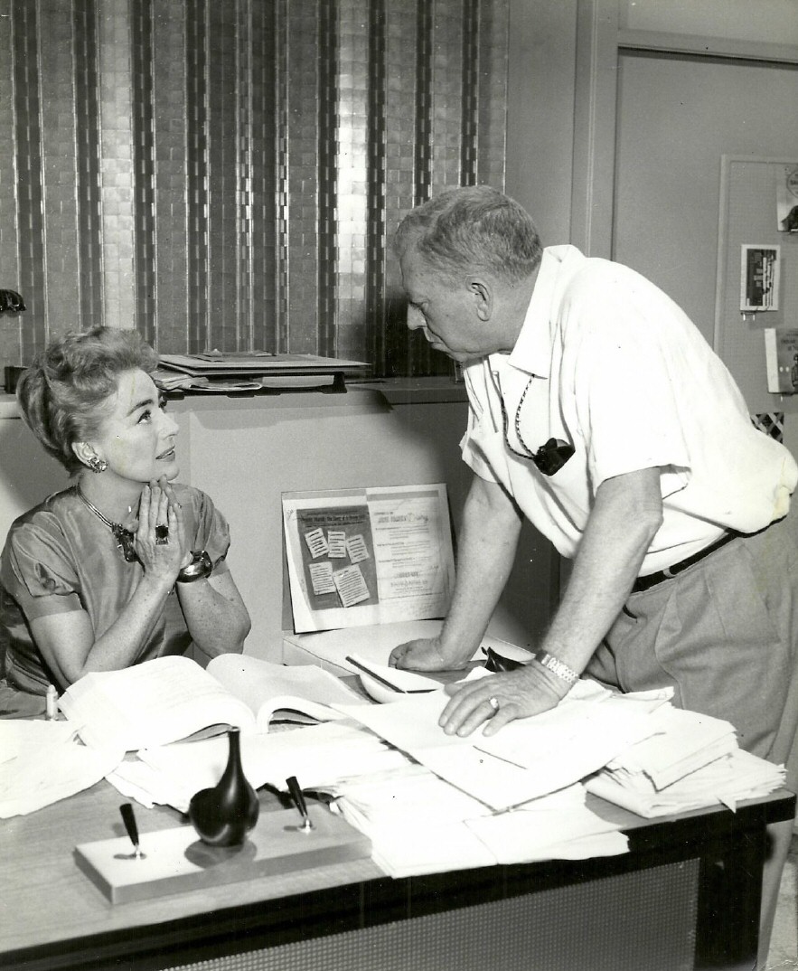 1959. On the set of 'The Best of Everything' with cameraman William Miller.