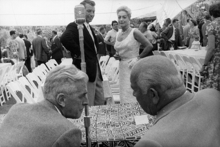 1959, at a 20th Century-Fox party. Studio head Spyros Skouros at lower right. Photo by Eve Arnold.