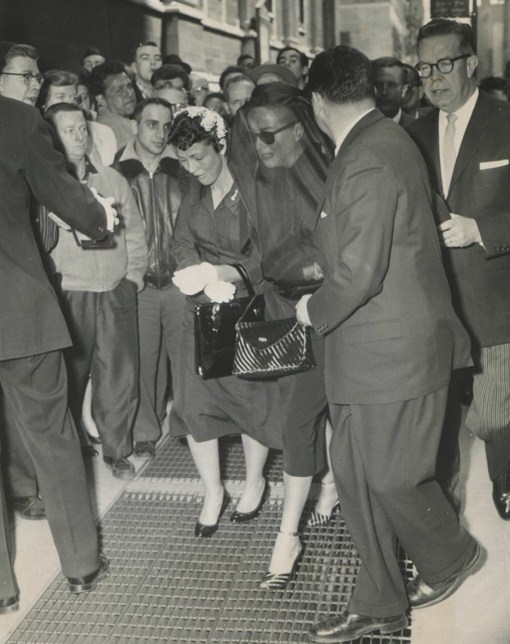 April 22, 1959. At Al Steele's funeral, with Steele's daughter Sally. 