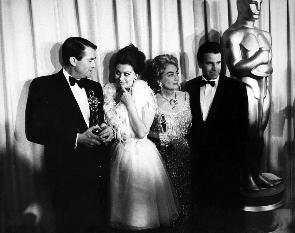 4/8/63. At the Oscars with Gregory Peck, Sophia Loren, and Maximilian Schell.