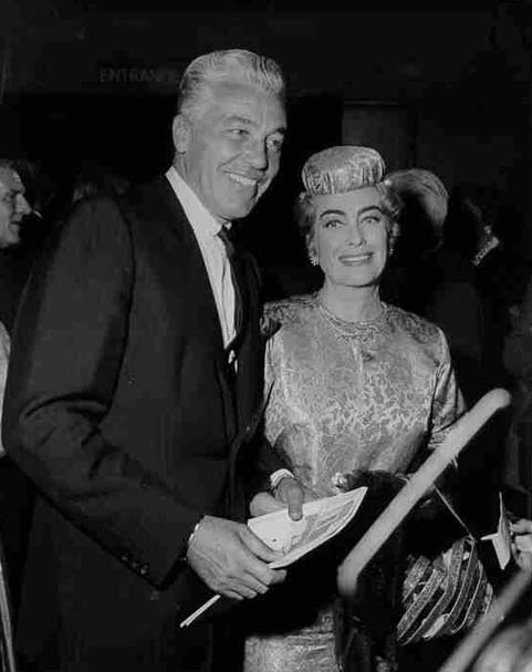 Circa 1964. Joan with Cesar Romero.