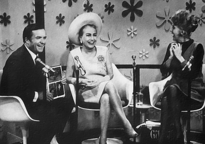 September 1968 on 'The Mike Douglas Show.' Douglas is holding the just-released 'Films of Joan Crawford' book.