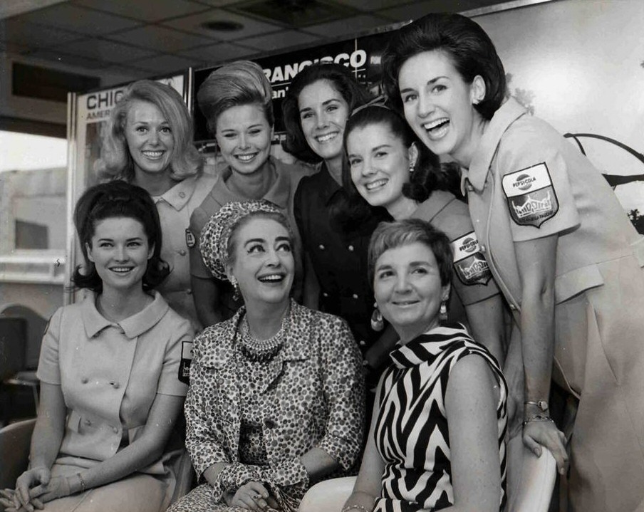 1967. Joan with various Miss Americas, as they prepare to go to Vietnam to entertain the troops.