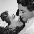 With Robert Taylor.