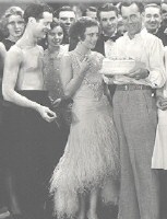 Conway celebrates his birthday on the set of 'Untamed' with Robert Montgomery and Joan.