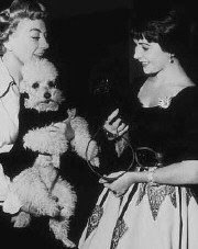 Joan and Liz on the 'Torch Song' set, 1953.