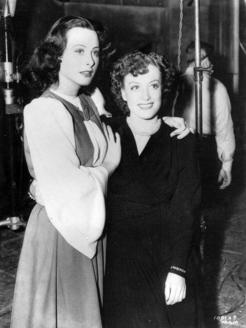 1939. On the set of 'The Women' with Hedy Lamarr.